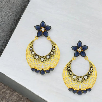 Flower Chaand Bali Earrings featuring intricate filigree work and Kundan-Polki stones in a glossy finish.