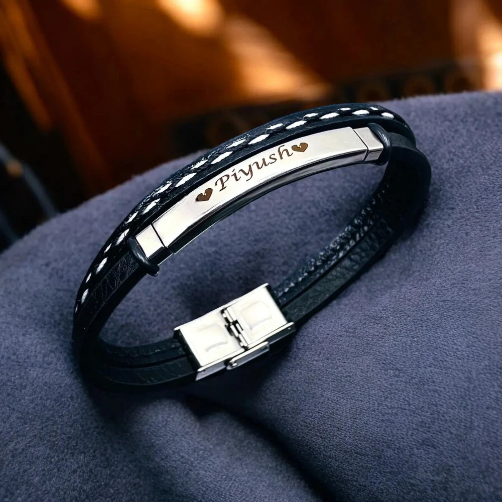 Men's dual-layer leather bracelet with glossy and matte silver plating, close-up shot.