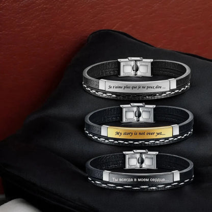 Silver and black leather men's bracelet shown in a gift box, perfect for gifting occasions.