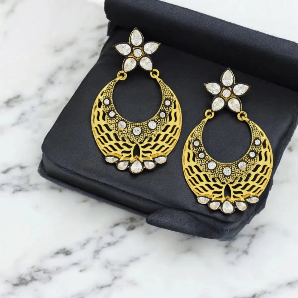 Side view of large Flower Chaand Bali Earrings, highlighting the detailed craftsmanship and glossy gold plating.